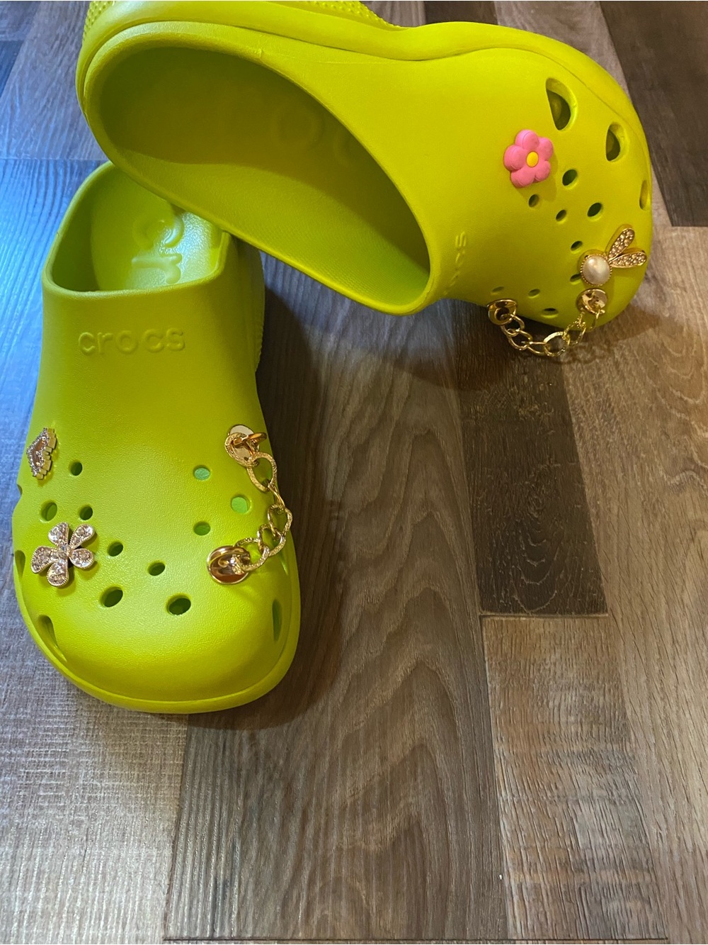 CROCS Neon Yellow Slip-On Clogs with Gold Charm Accents
